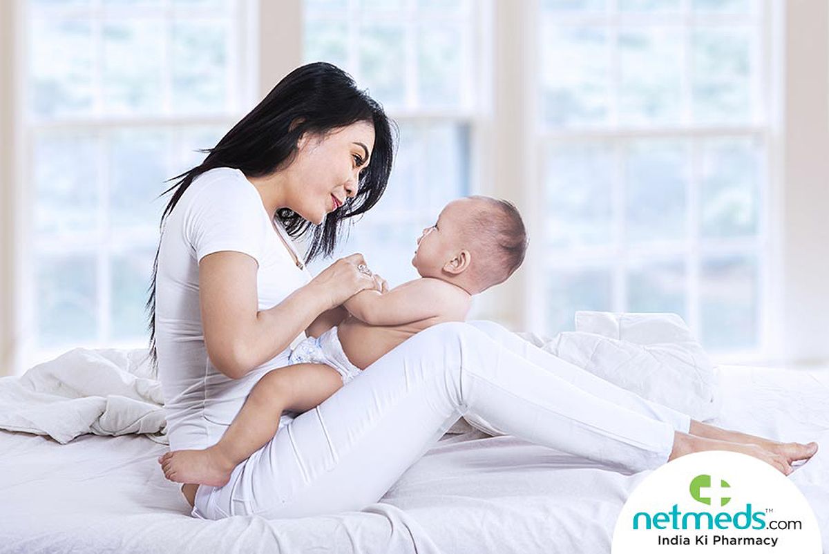 A baby enjoying a warm bath for colic relief